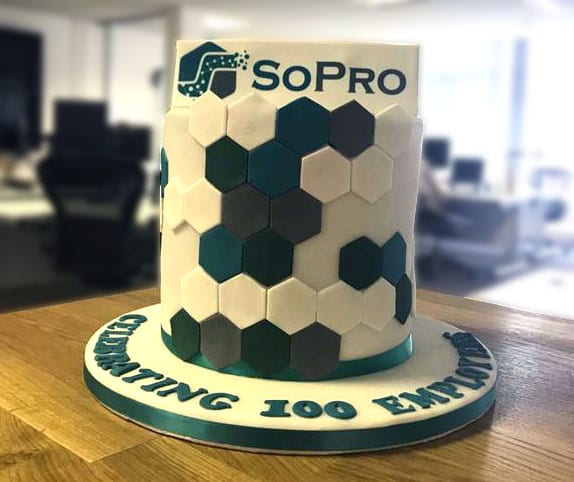 A cake with sopro - celebrating 100 employees decoration