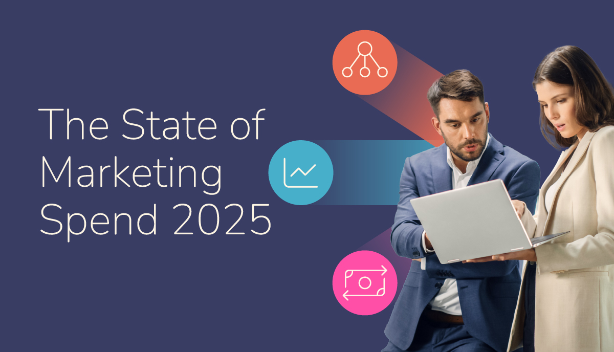 The state of marketing spend 2025. A man and woman looking at a laptop.